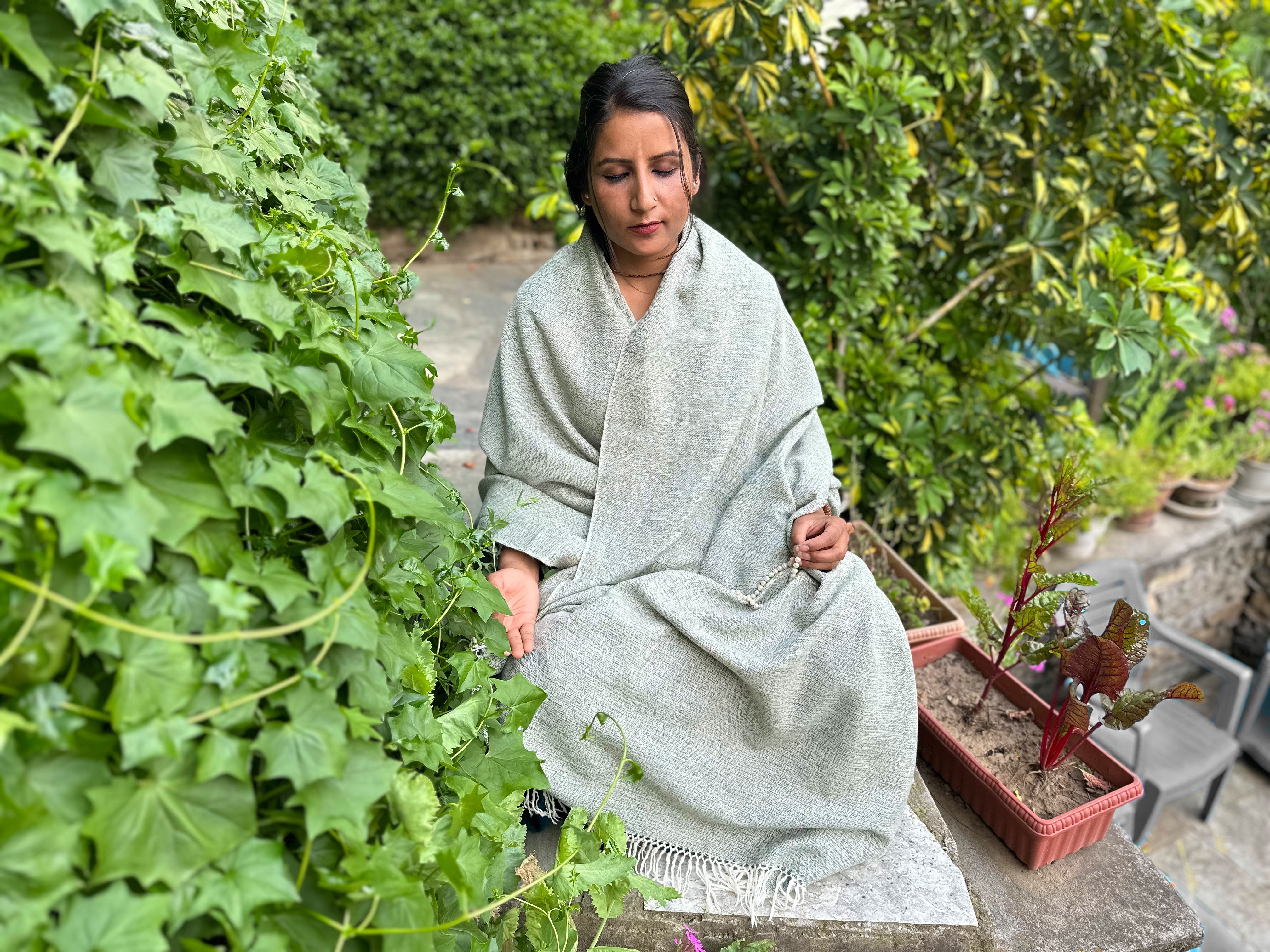 Grey meditation shawl, featuring a cozy drape for comfort.