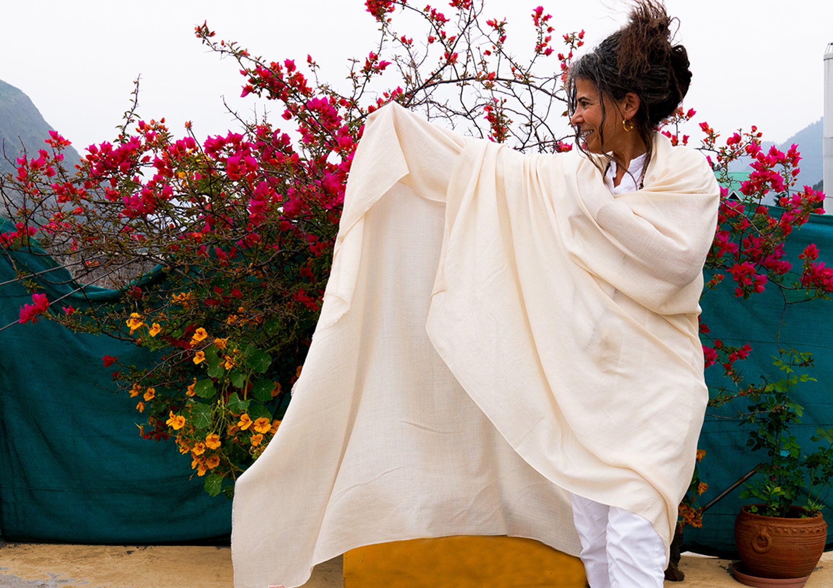 White merino wool shawl in a large size, perfect for meditation and warmth, highlighting its smooth texture.