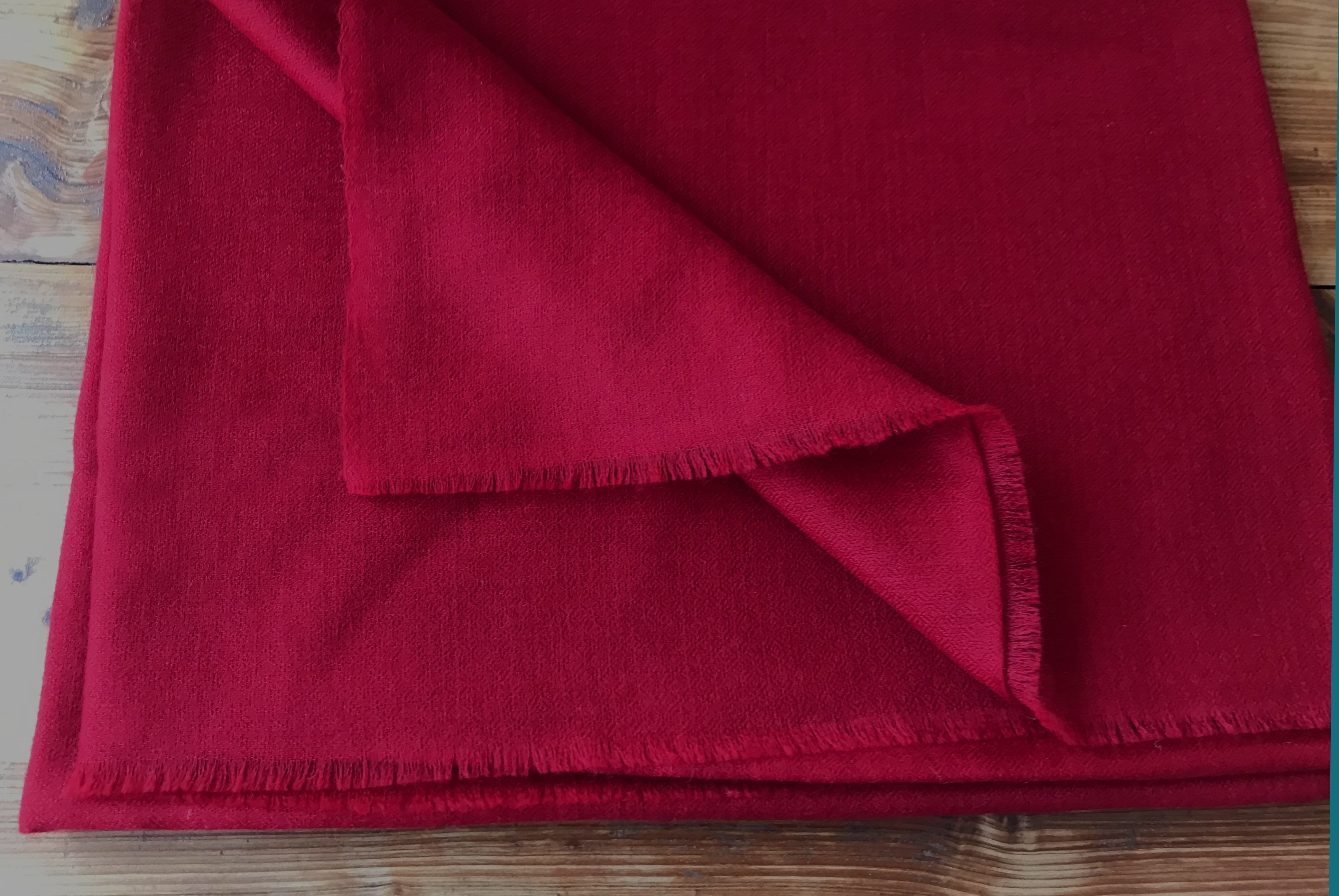 Rich deep red bodhisatta pashmina shawl, known for its warmth and luxurious texture, perfect for meditation.