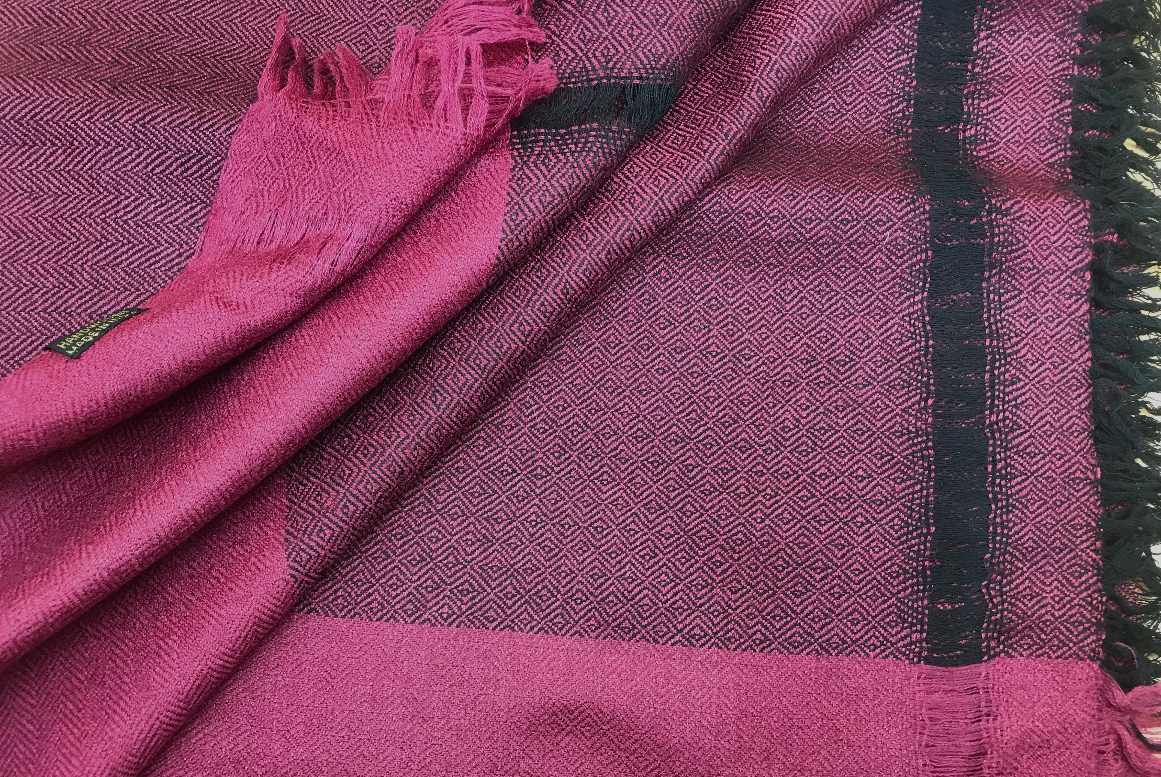 Red shawl from the Himalayas, featuring traditional handwoven details, suitable for meditation and casual wear.