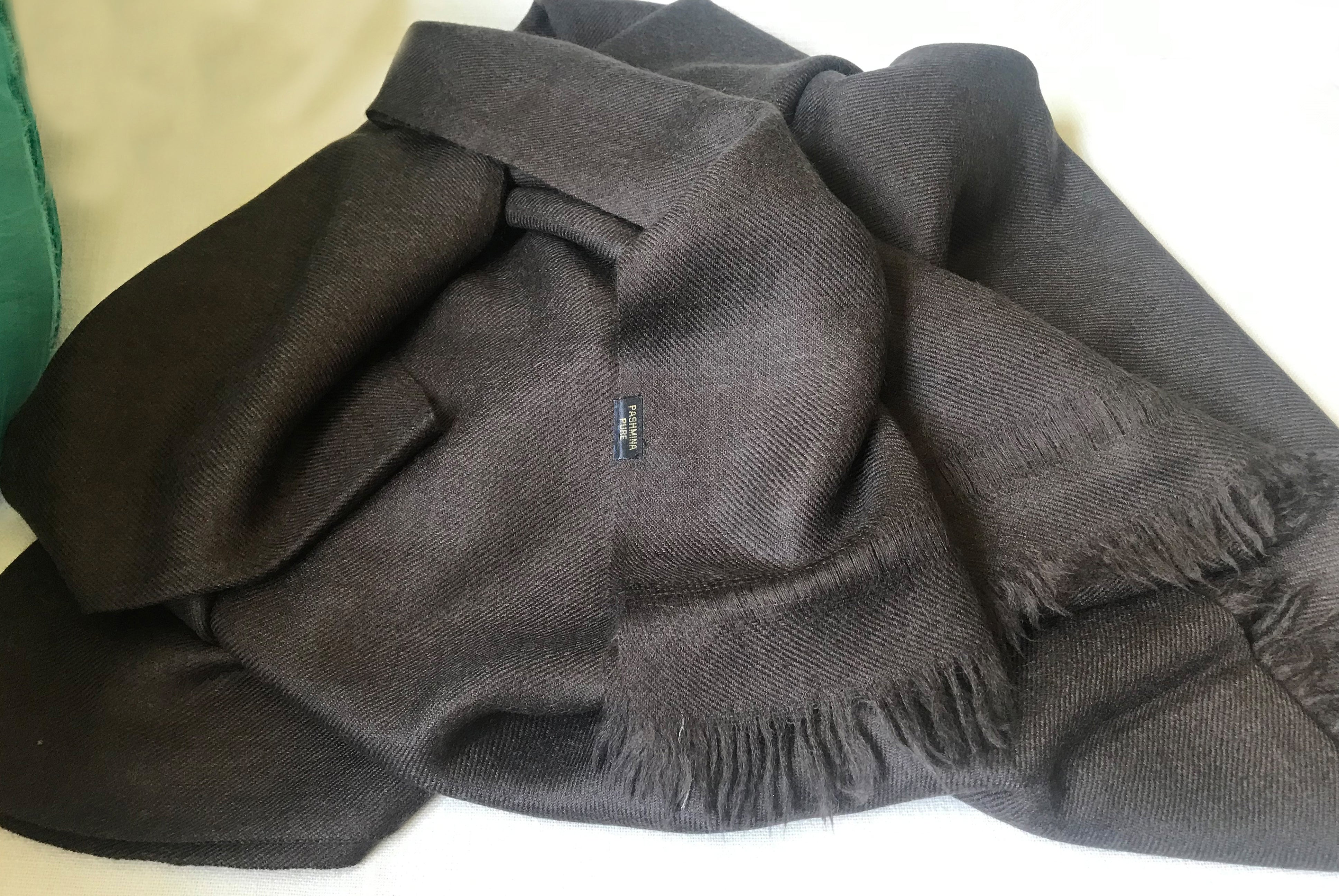 Elegant brown cashmere shawl for meditation, providing warmth and luxury.