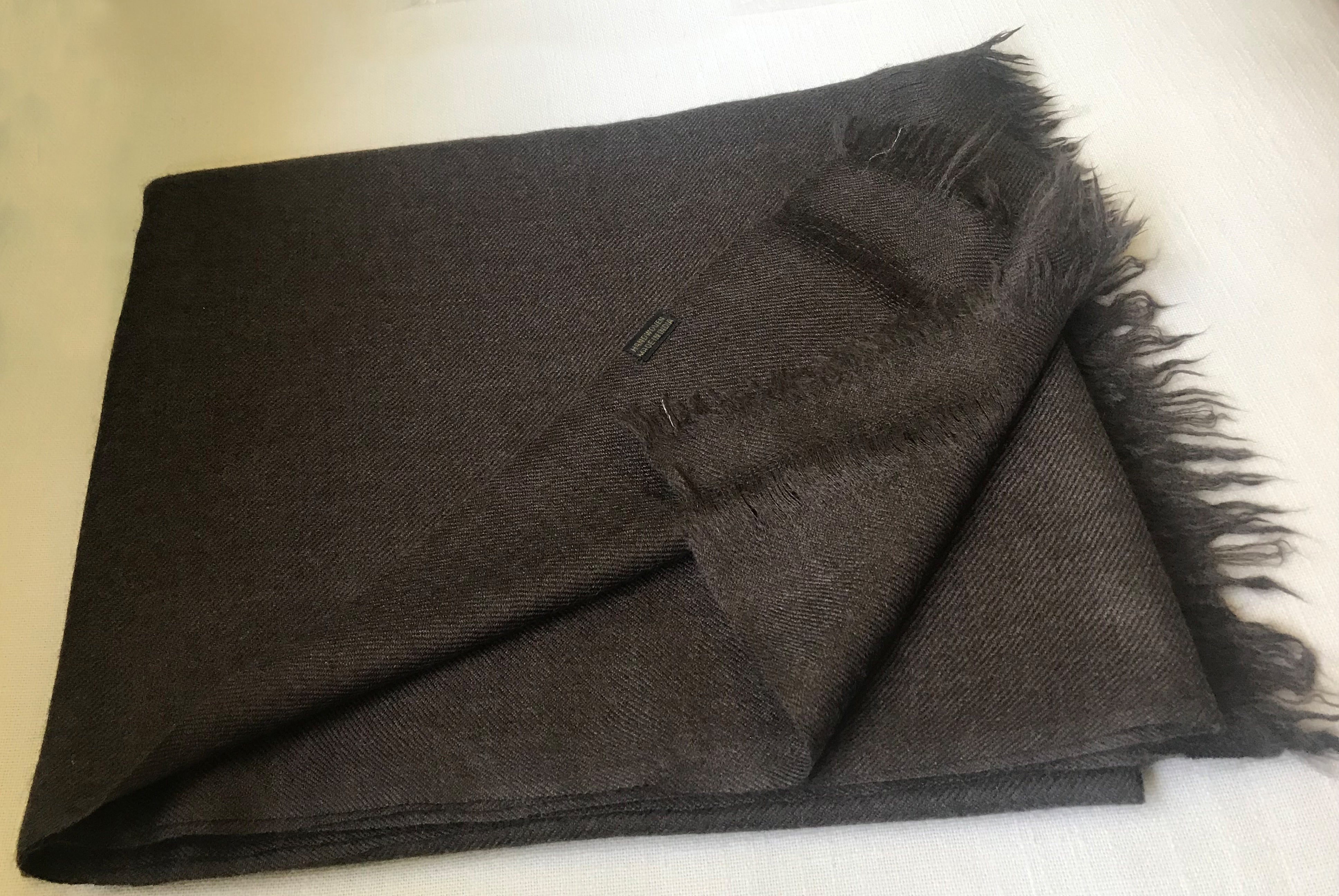 Traditional brown cashmere shawl for meditation, embodying comfort and classic style.